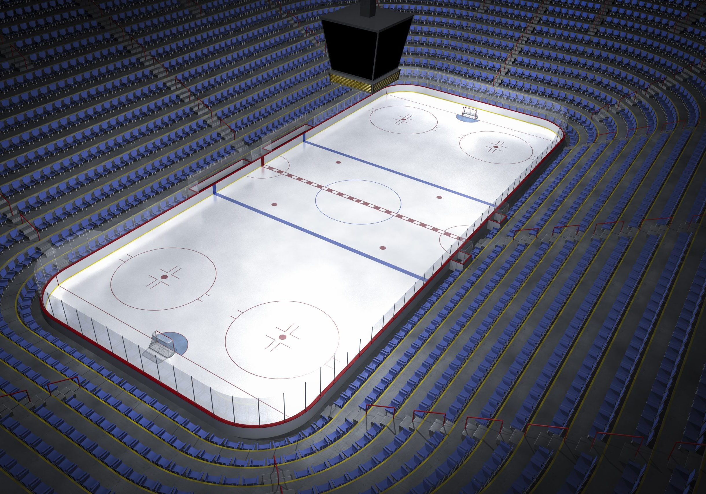 Empty hockey arena with score board.